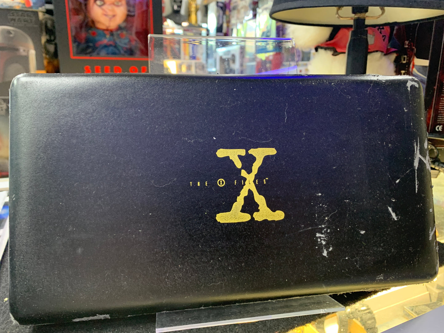 The X Files Gold Classic collection case old and warn phone cards