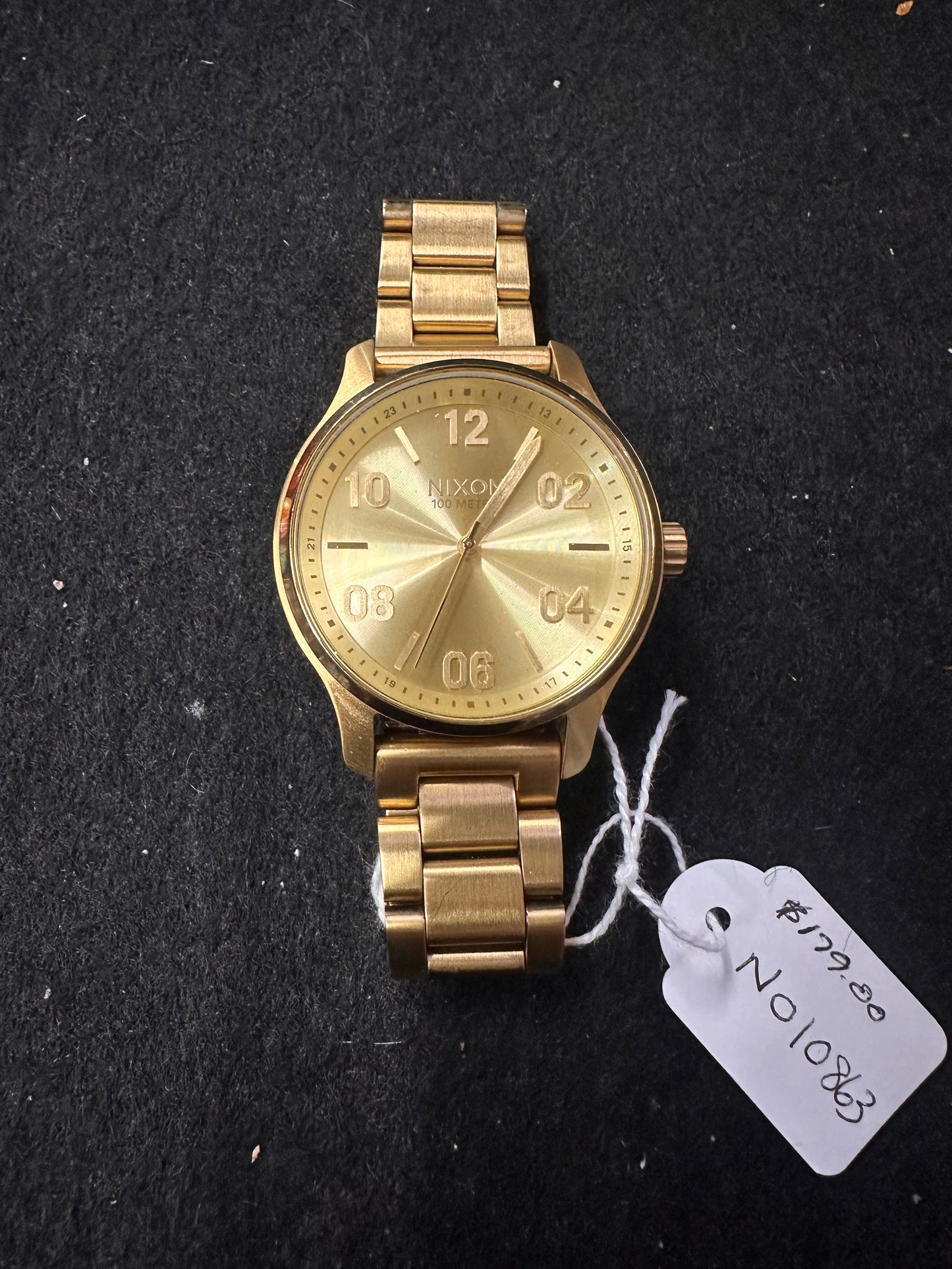 NIXON GOLD MENS WATCH
