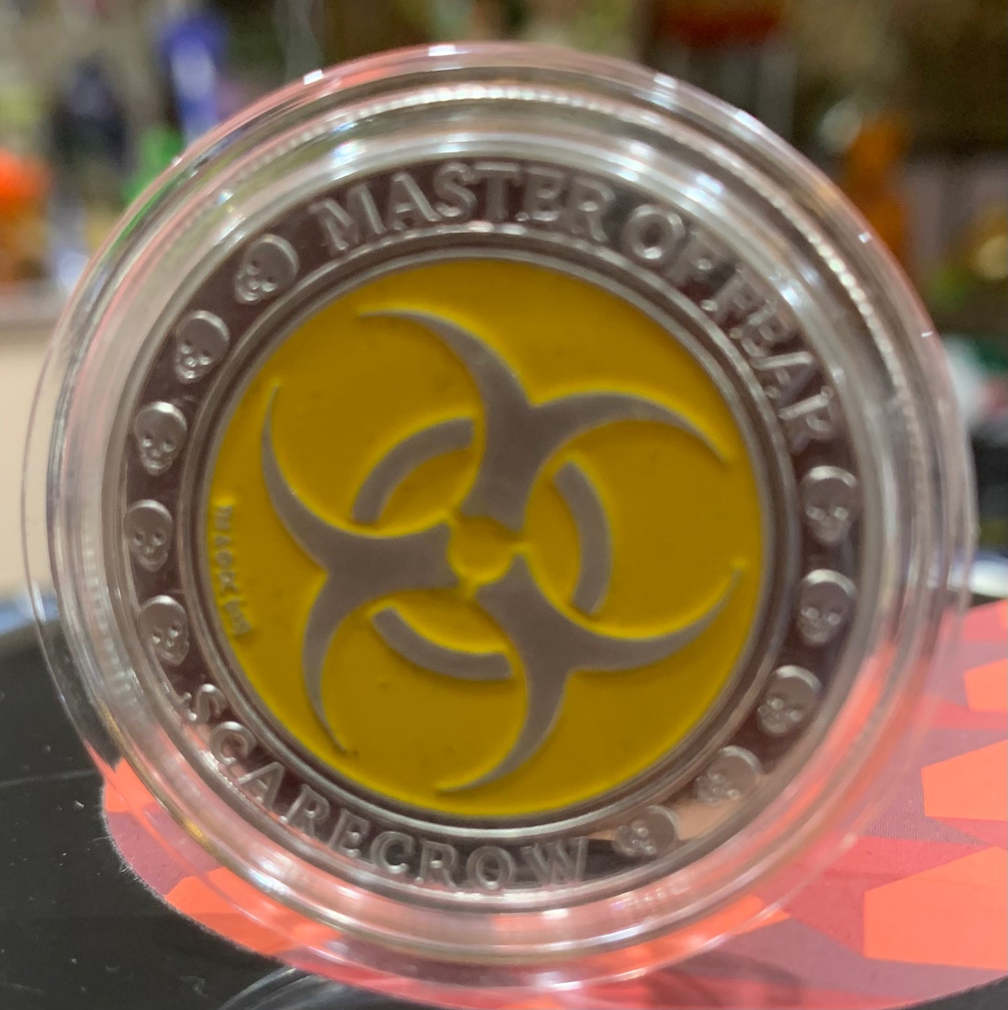 Scarecrow coin in protective case