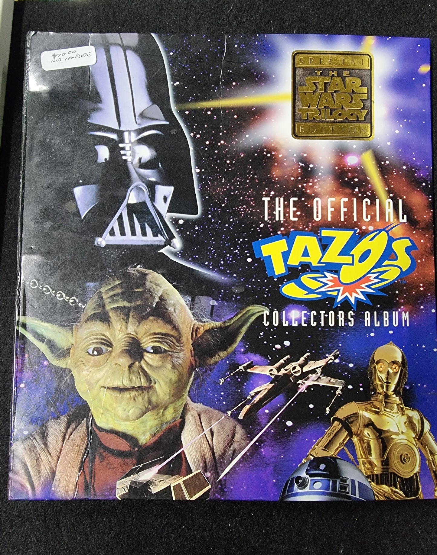 STAR WARS TRILOGY THE OFFICIAL TAZOS COLLECTORS ALBUM (NOT COMPLETE)