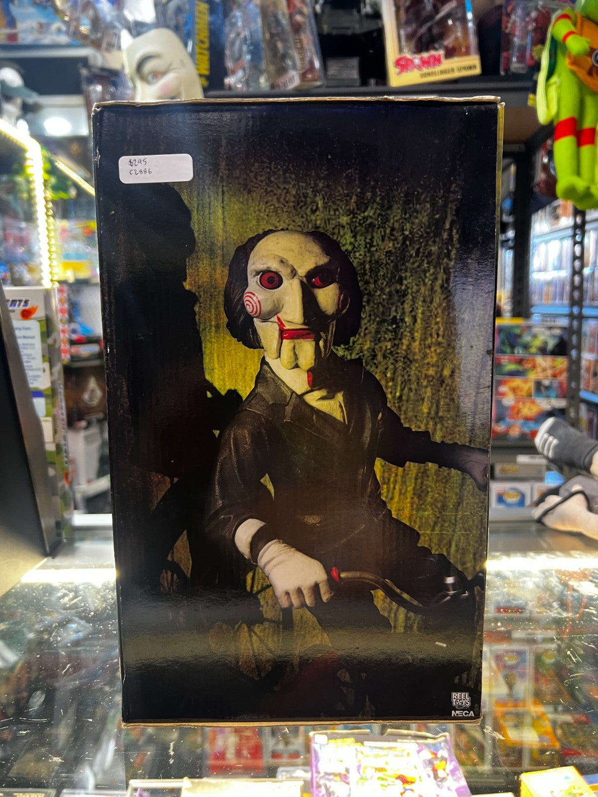 Saw 12 inch Action Figure - Riding Tricycle With Sound - NECA