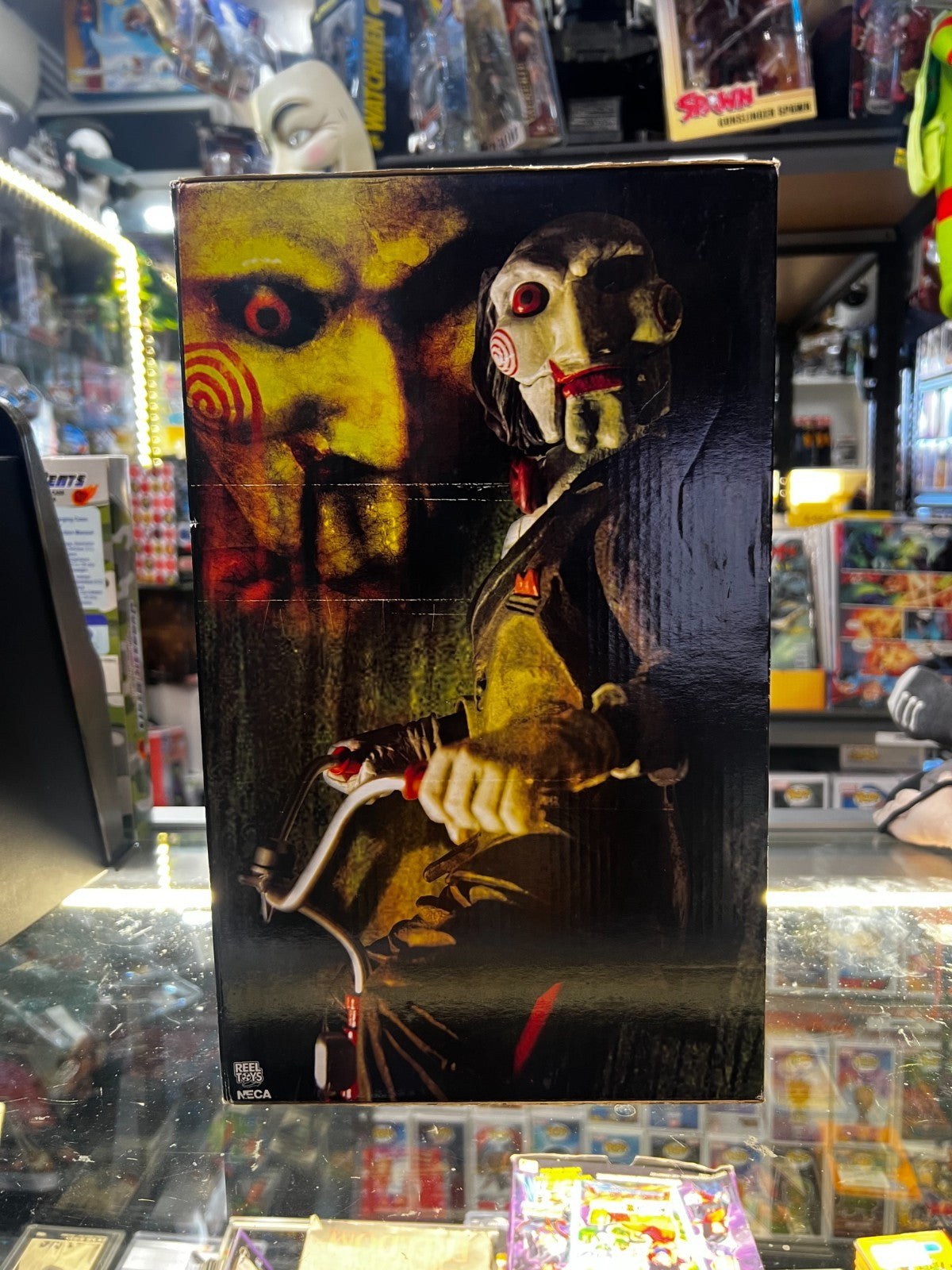 Saw 12 inch Action Figure - Riding Tricycle With Sound - NECA