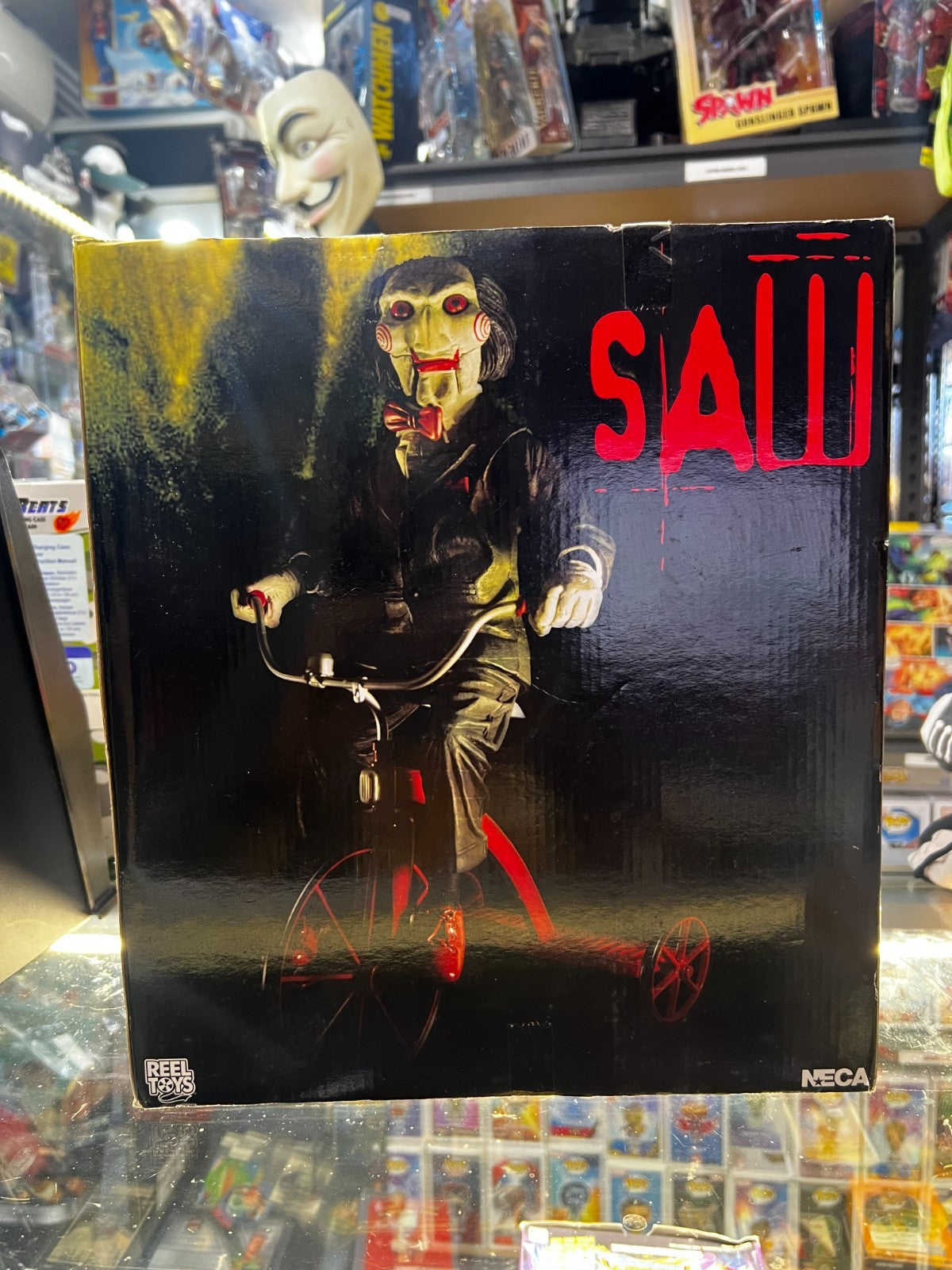 Saw 12 inch Action Figure - Riding Tricycle With Sound - NECA
