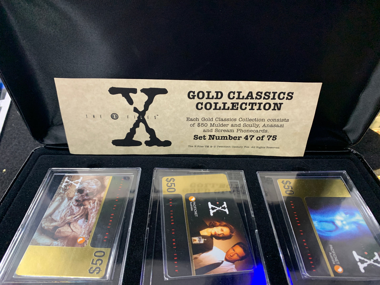 The  XFiles gold classics collection phone cards box is warm