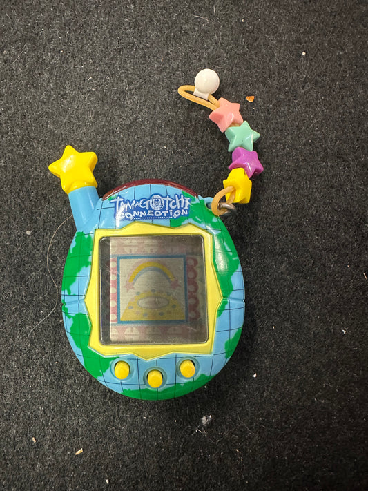 TAMAGOTCHI BLUE AND YELLOW