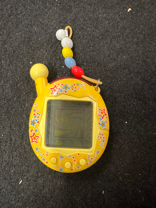 TAMAGOTCHI YELLOW