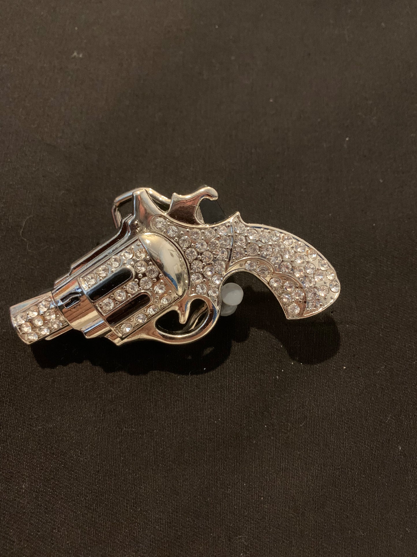 Belt buckle gun