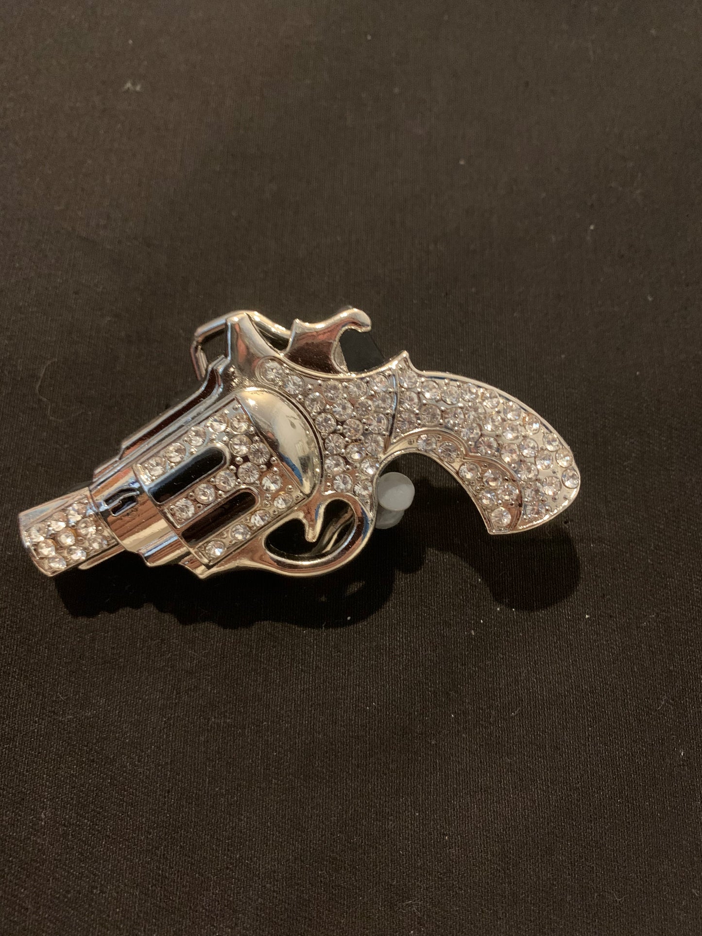 Belt buckle gun